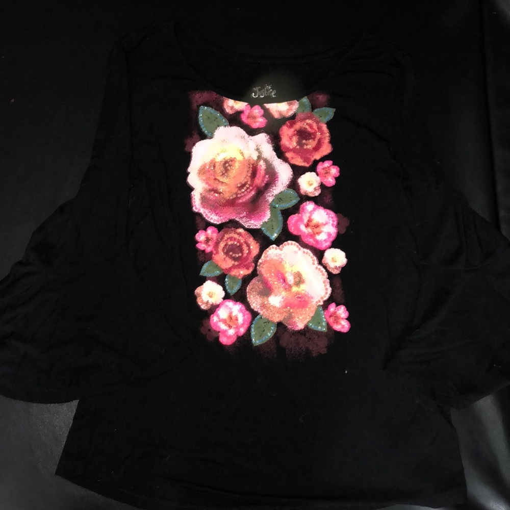 A black long sleeve shirt. New without tag.